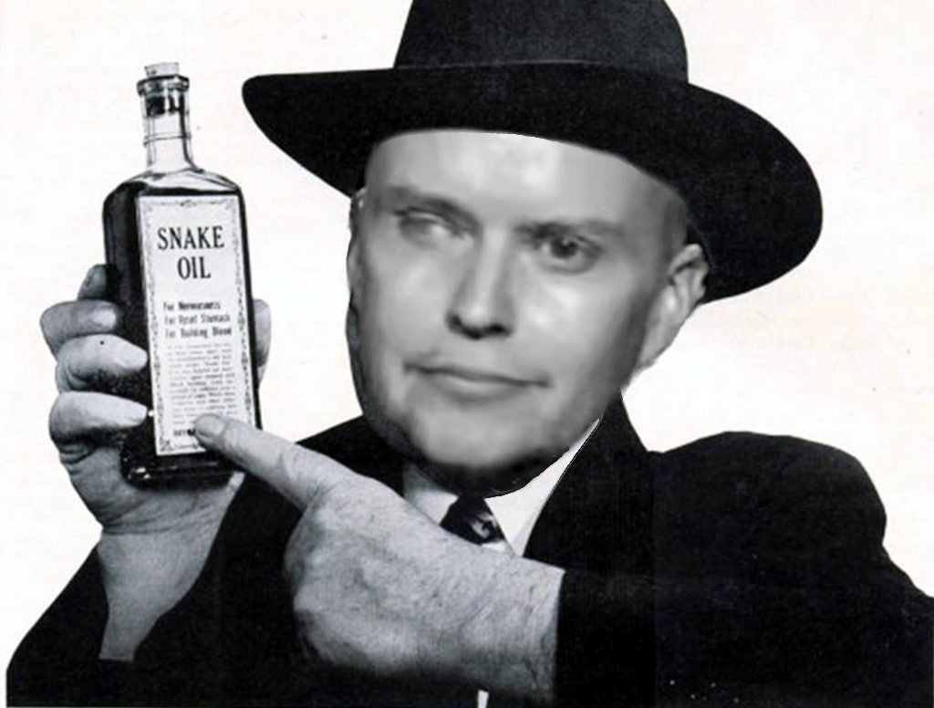 Lucien Greaves as a snake oil salesman